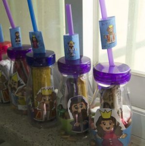 purim bottles with purim character cupcake wrappers and chocolate wrappers via birkat chaverim